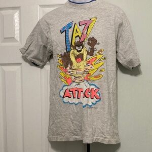 Vintage 90s taz double shirt repping New Orleans on the back